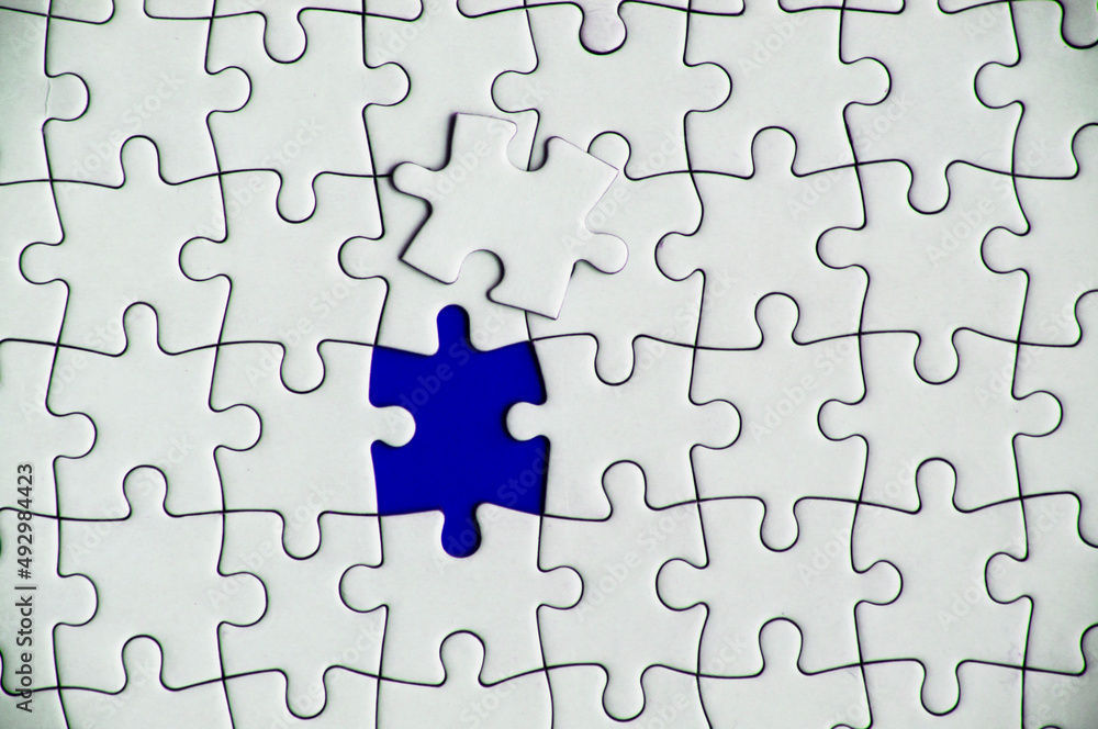 Fototapeta premium Top view of missing jigsaw puzzle. Conceptual