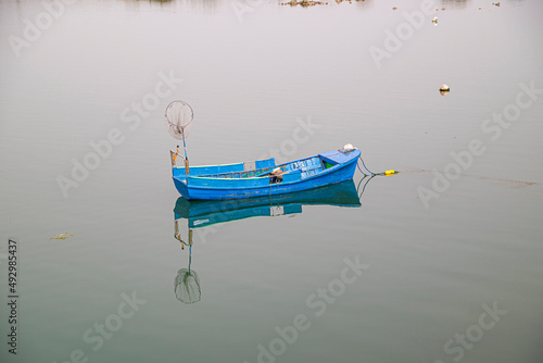 small fishing boats moored in port