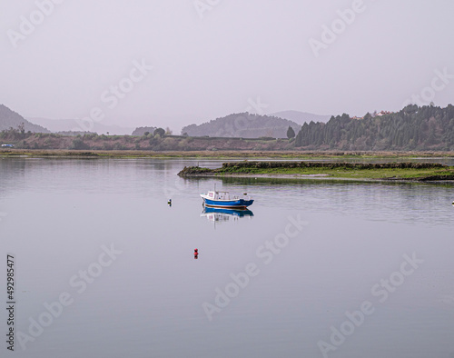 small fishing boats moored in port