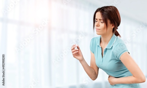 Flatulence young woman, girl hand in stomach ache, suffer from food poisoning, abdominal pain