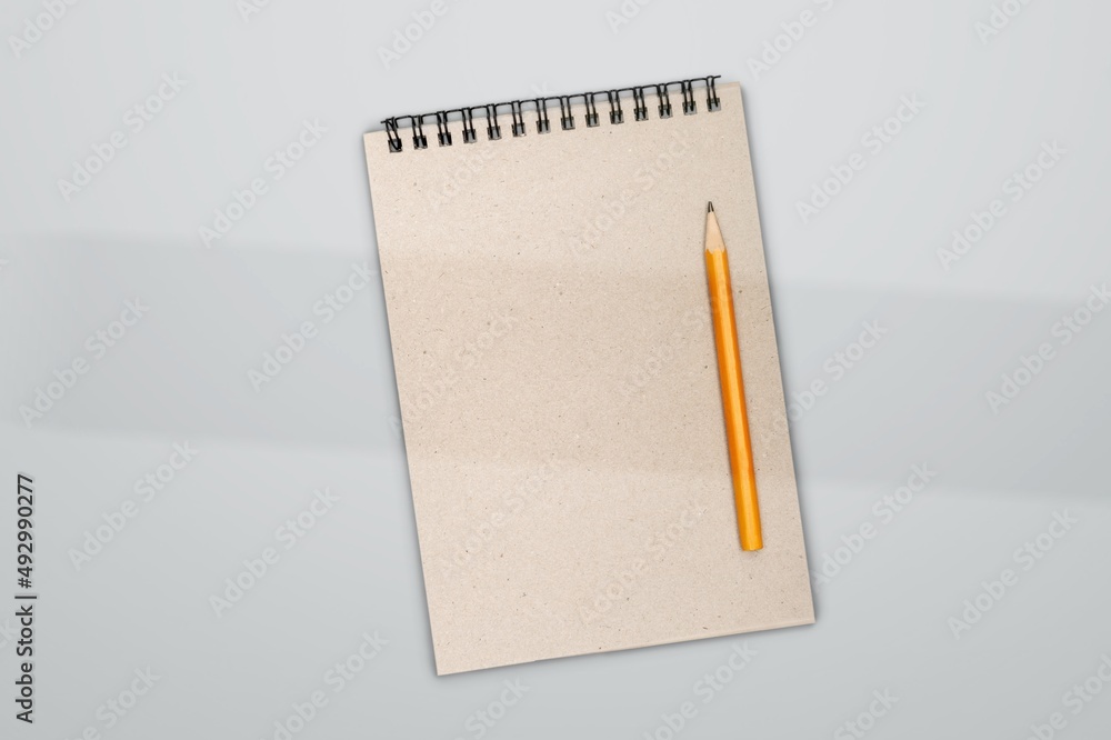 A white plain diary or blank journal for writing note and messages. Sketchbook or booklet with open page A white plain diary or blank journal for writing note and messages. Sketchbook or booklet with open page