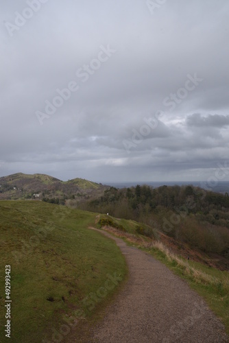 a path that leads down the hill at British camp in Malvern