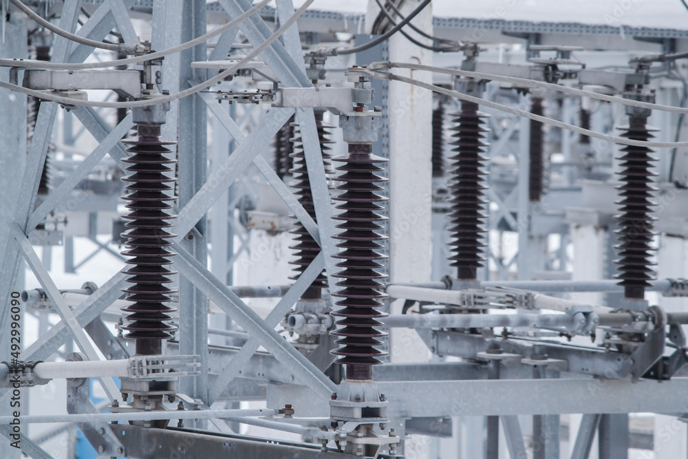 Highvoltage oil circuit breakers at an electrical substation. Electric