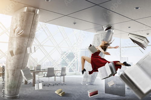 Female dancer against offic...