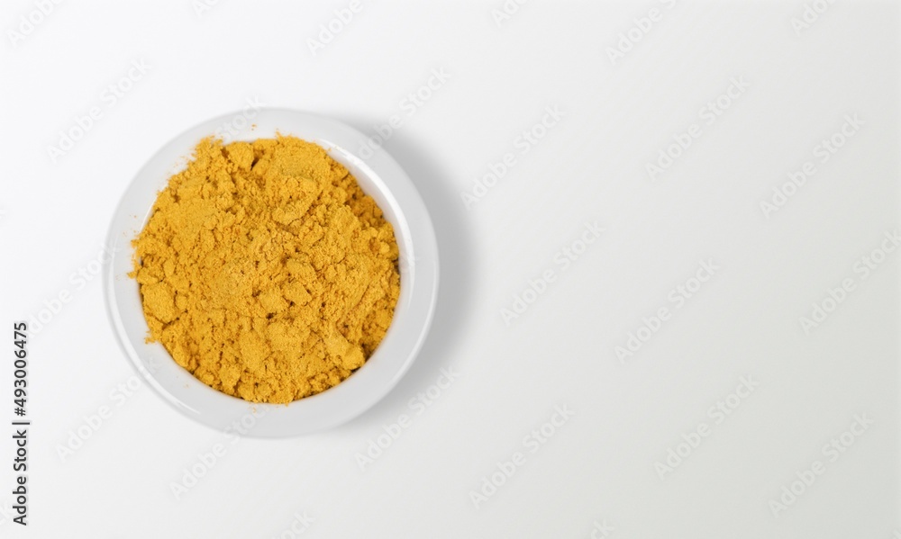 Organic Curcuma Powder on laboratory table. Organic Curcuma Powder on laboratory table.