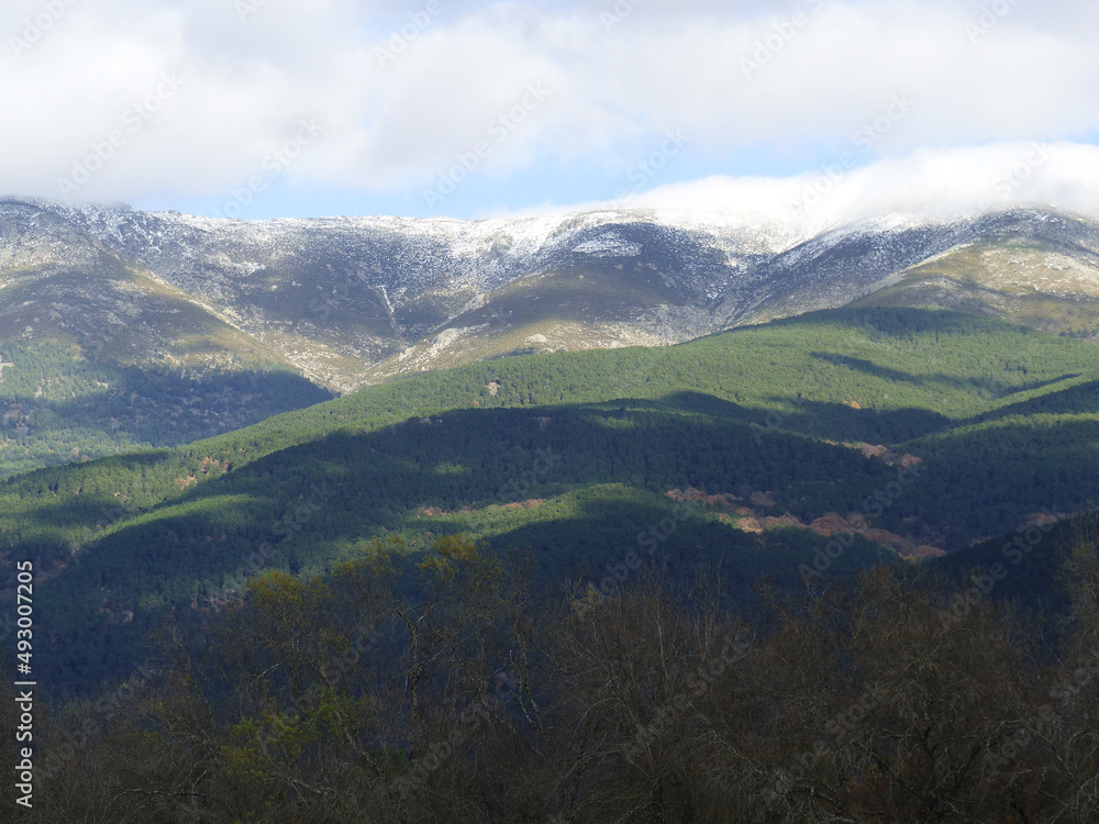 typical landscapes of Avila with rivers, horses, cows, mountains, meadows and nature typical landscapes of Avila with rivers, horses, cows, mountains, meadows and nature