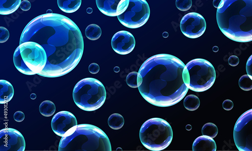 Set of realistic transparent colorful soap bubbles with rainbow reflection. Soap bubbles foamy realistic with rainbow colors in an isolated transparent background.