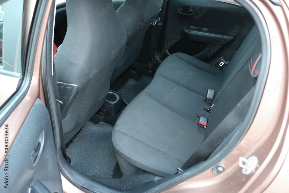 Rear seats of car interior.