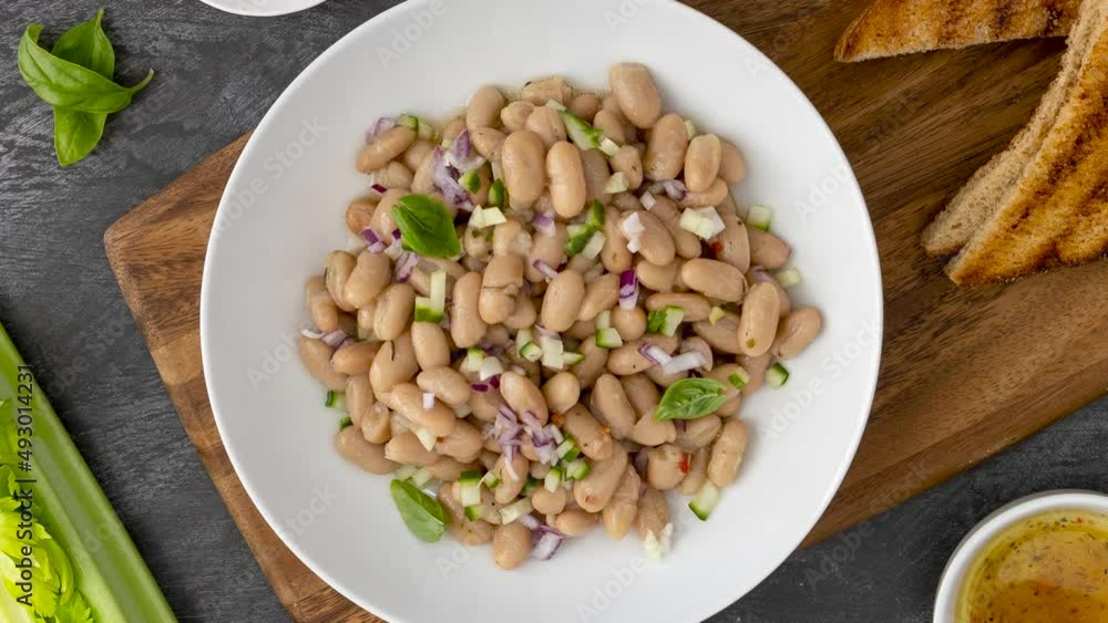 Rotating Bowl of White Bean Salad Rotating Bowl of White Bean Salad