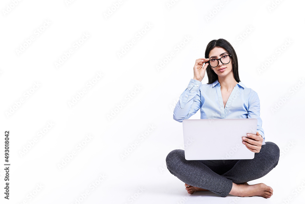 A beautiful business woman with notebook computer. A beautiful business woman with notebook computer.