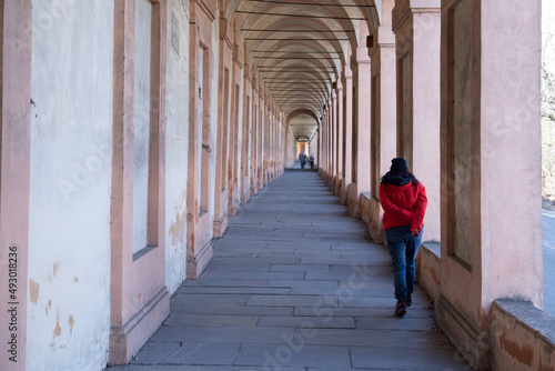 Beautiful streets of Bologna in the morning, arcaded streets with columns photo