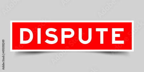 Sticker label with word dispute in red color on gray background