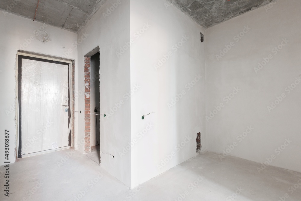 interior of the apartment without decoration in gray colors interior of the apartment without decoration in gray colors