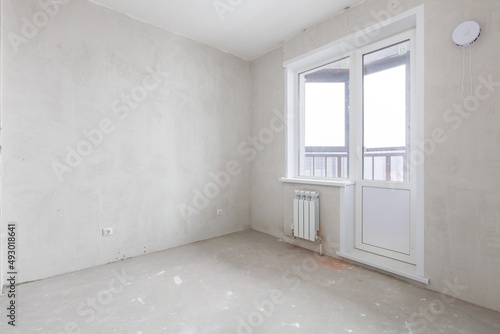 interior of the apartment without decoration in gray colors