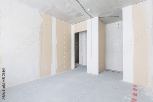 interior of the apartment without decoration in gray colors