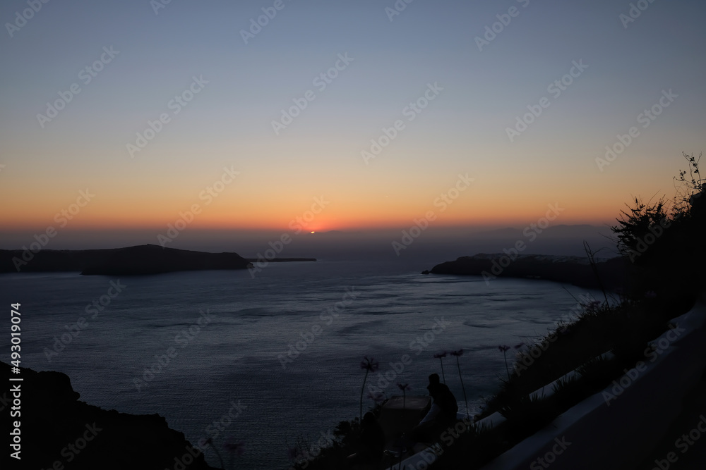 Panoramic and colourful sunset of the Aegean Sea in Santorini Greece