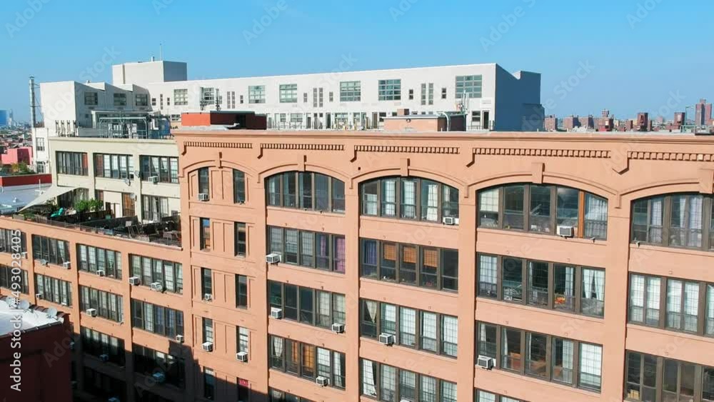 Large apartments with huge windows in metropolitan area, aerial blue sky Large apartments with huge windows in metropolitan area, aerial blue sky