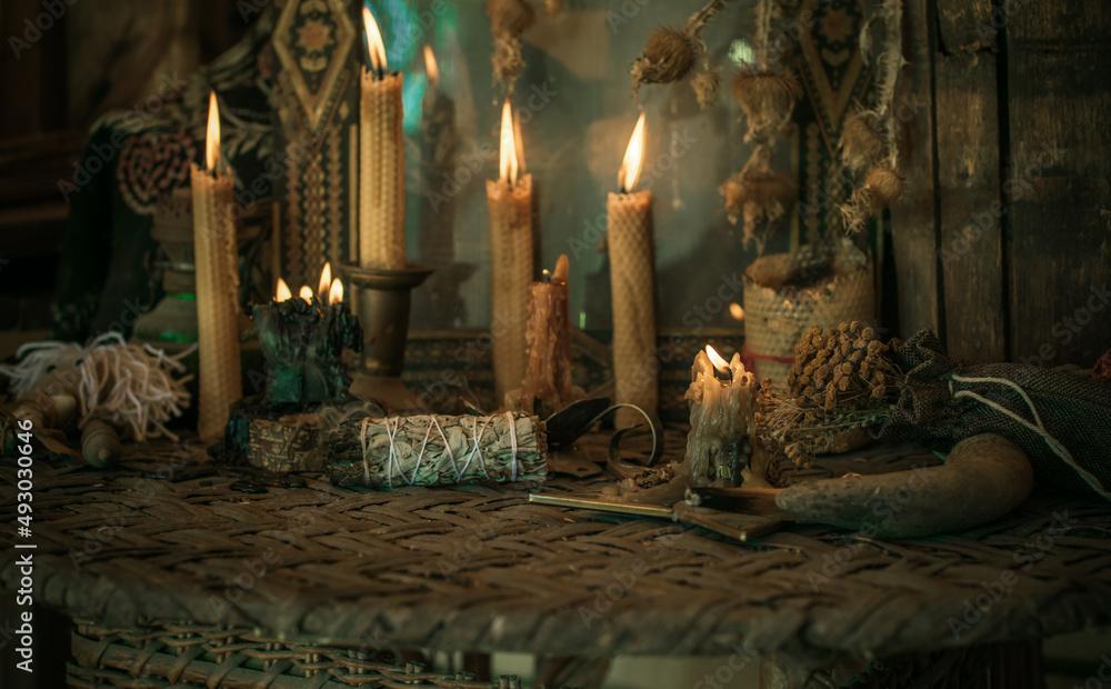 Candle burns on the altar, powerful magic among candles, pagan or wicca  concept Stock Photo | Adobe Stock