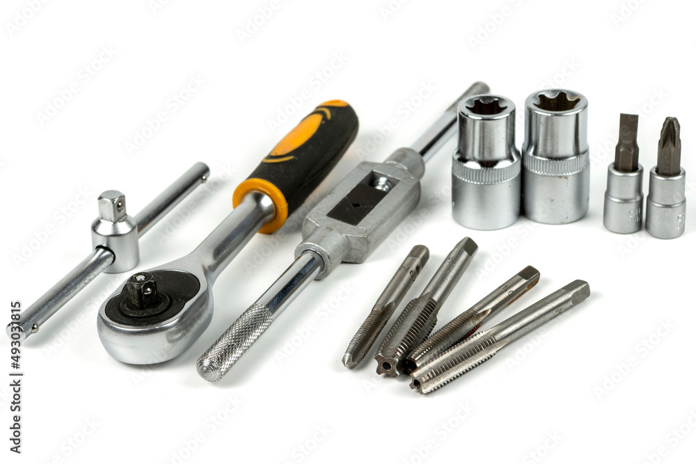 a set of professional tools for threading a hole in a repair a set of professional tools for threading a hole in a repair
