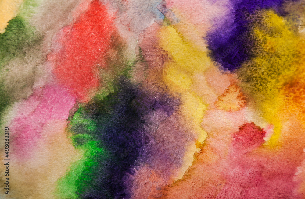 Watercolor blur on aqarelle paper. Multicolored spreads. Purple and fuxia pink yellow and red.
