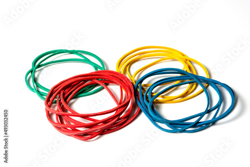 Abstract background. Colored rubber bands for money against white background