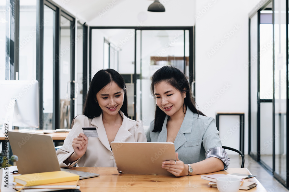 Woman enjoy with online shopping application and typing credit card for fill number to payment with virtual digital asset and metaverse.