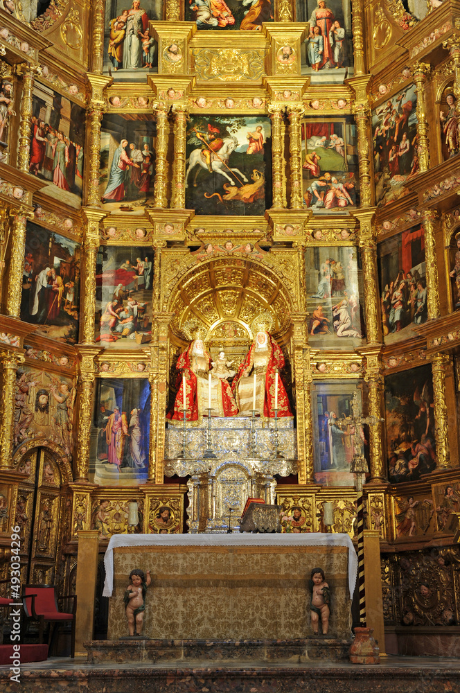 Main altar in the apse of the church of Santa Ana in the Triana neighborhood, Seville, Andalusia, Spain. This church is known as the Triana Cathedral.