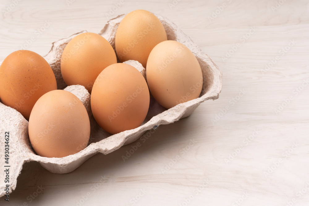 Organic chicken eggs on the table. Eggs are good for everyone and health. Farm products, natural eggs. Organic chicken eggs on the table. Eggs are good for everyone and health. Farm products, natural eggs.