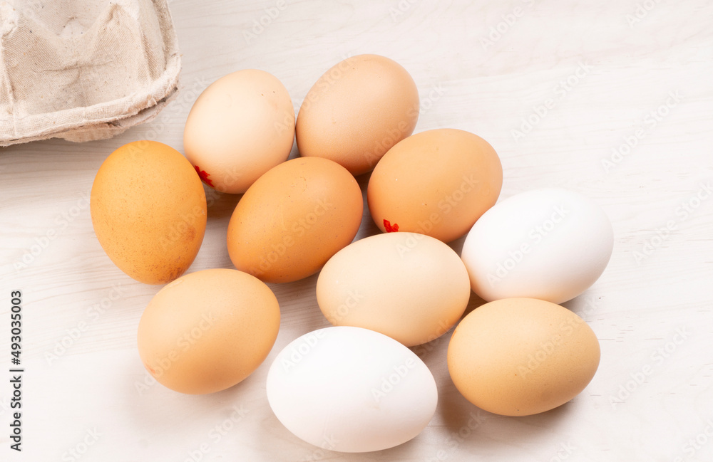 Organic chicken eggs on the table. Eggs are good for everyone and health. Farm products, natural eggs. Organic chicken eggs on the table. Eggs are good for everyone and health. Farm products, natural eggs.
