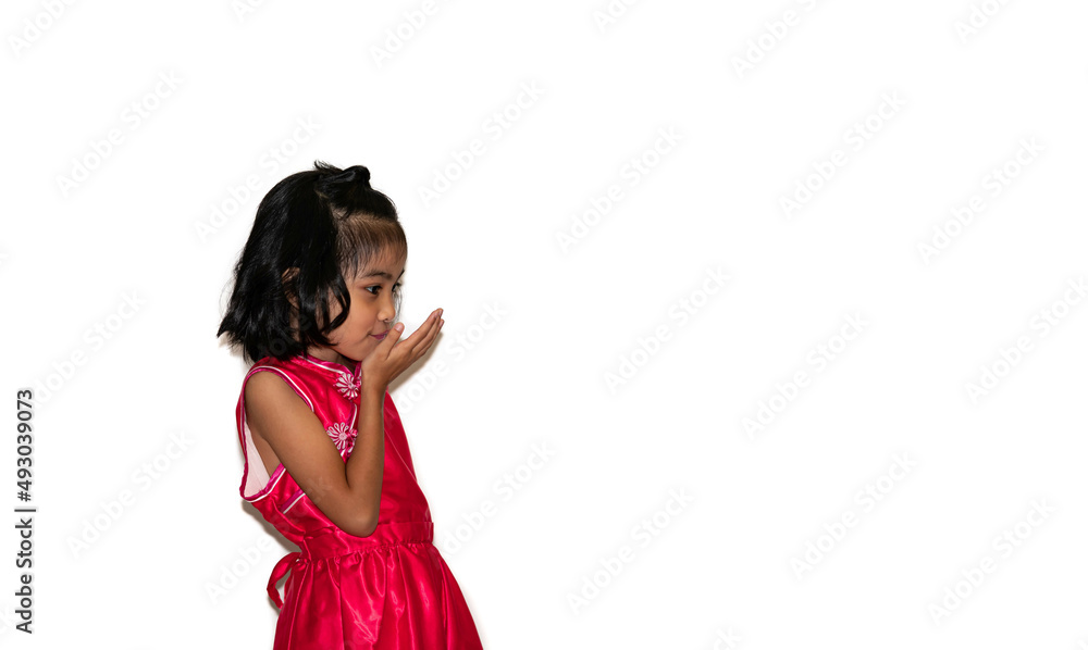 happy, smiling female asian kid playing and flying kiss Blowing hand happy, smiling female asian kid playing and flying kiss Blowing hand