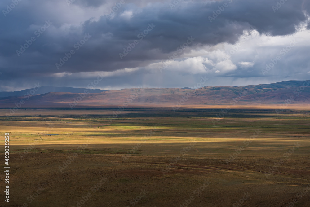 steppe mountains rain clouds sunlight sunset steppe mountains rain clouds sunlight sunset