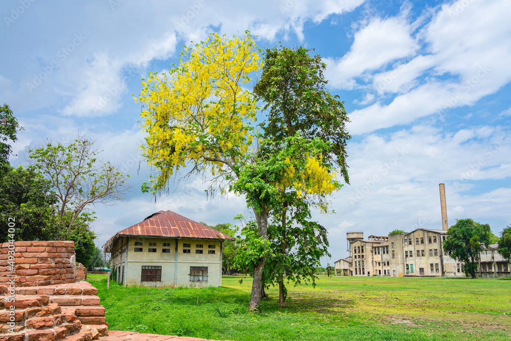 Obraz premium The old paper mill used to produce paper and banknotes during World War II, transformed into a new public attraction in Kanchanaburi, Thailand. (Cultural Economics with Tourism). Historical buildings.