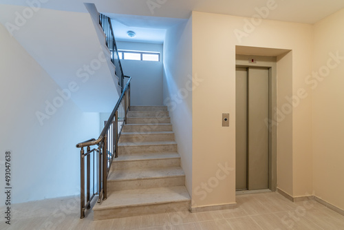 Elevator and stairs in a modern building © dechevm