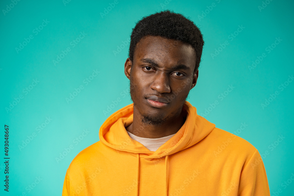 Young black anxious man worried nervous fail problem over mint background Young black anxious man worried nervous fail problem over mint background
