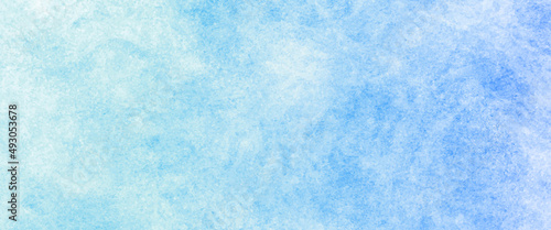 Blue background with grunge texture, watercolor painted mottled blue background, colorful bright ink and watercolor textures on white paper background.