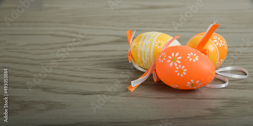 Wall Mural template on easter with eggs on a wooden background