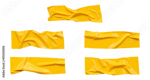 Yellow wrinkled adhesive tape of different sizes isolated on white background. Vector illustration.