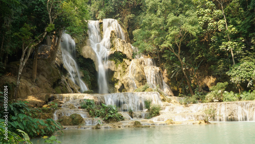 Kuang Si Waterfall in tropical rainforest setting in Laos.