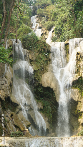 Kuang Si Waterfall in tropical rainforest setting in Laos.