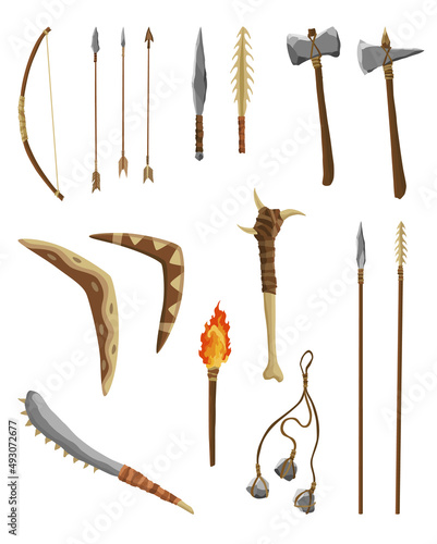 Ancient age stone tools and weapon for hunting or work. Cartoon hammer, axe, arrow and spear with arrowhead prehistoric caveman instrument.  illustration of primitive culture tools in flat style photo