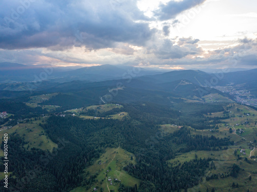 Green Ukrainian Carpathians mountains in summer. Aerial drone view. © Sergey