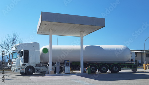 tanker car lorry for gass transportaion in gass station photo