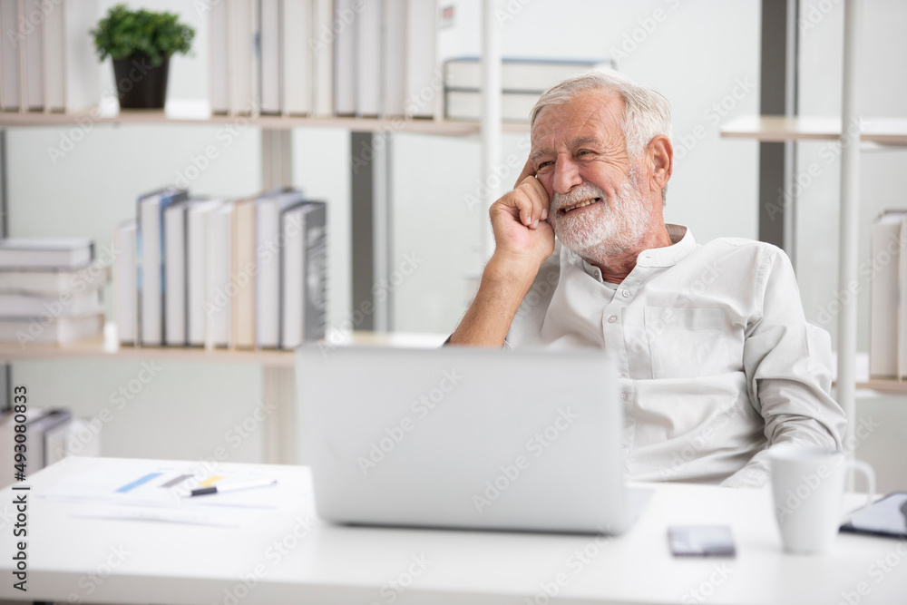 senior businessman with laptop computer and thinking something senior businessman with laptop computer and thinking something
