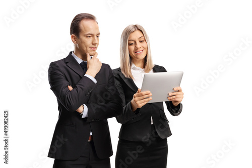 Young business people with a digital tablet