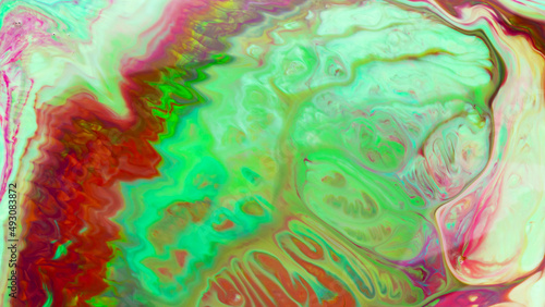 Fluid art background. Multicolored stains on a liquid surface. Creative background with colored spots