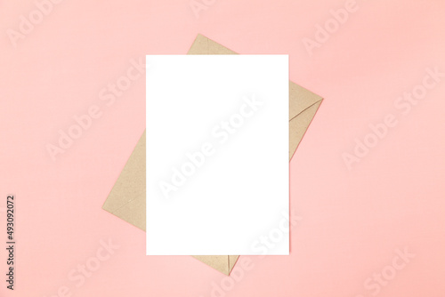 Wedding invitation or greeting card mockup and craft paper envelope