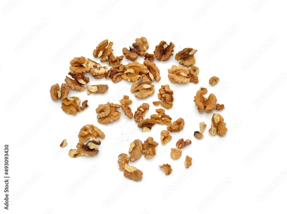 peeled walnut kernels on a white background