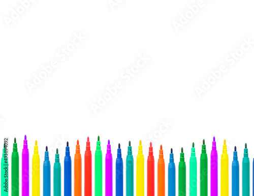 Colored markers on a white background
