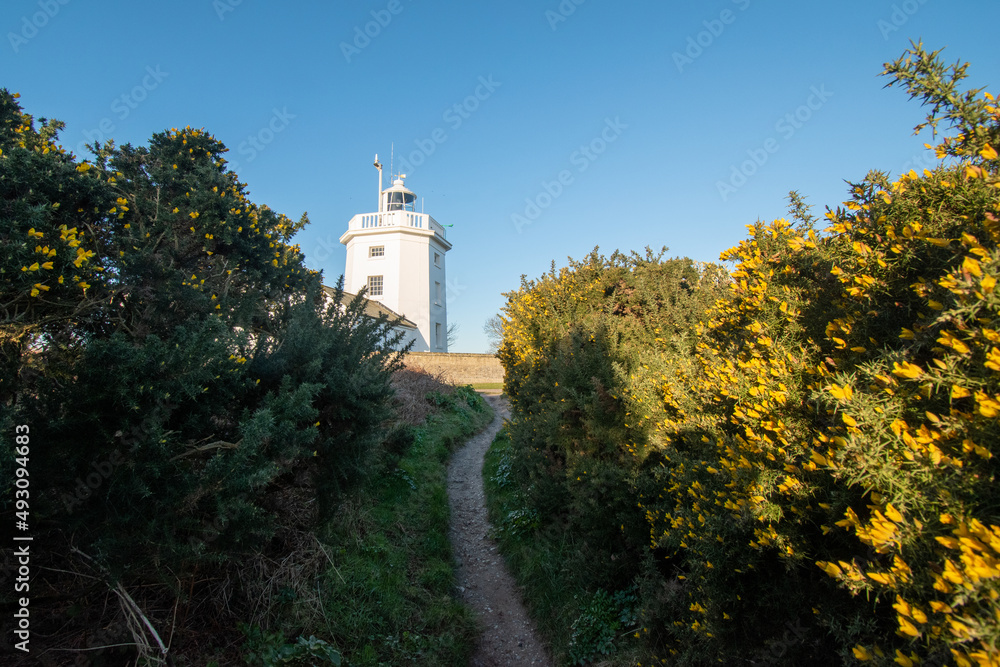Cromer lighthouse in north Norfolk, UK. No longer in use and now a holiday let. Photographed in March 2022. Cromer lighthouse in north Norfolk, UK. No longer in use and now a holiday let. Photographed in March 2022.