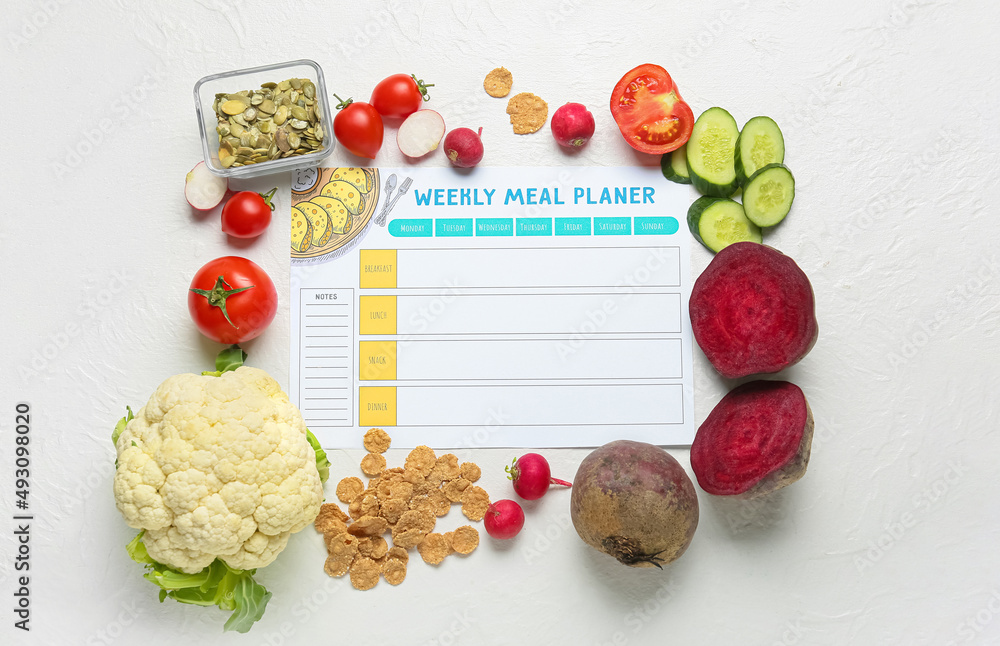 Weekly meal planner and different healthy products on light background - obrazy, fototapety, plakaty 